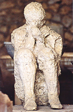 Plaster cast of a human being in Pompeii