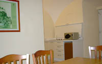 Apartment in Sorrento: Kitchen-corner with table and chairs of Armida Apartment in Sorrento