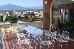 Sorrento Apartment: Terrace with table and chairs and a beautiful sea-view of Chiara Apartment in Sorrento