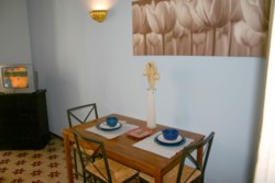 Particular of the bedroom with table