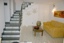 The living-room with the staircase
