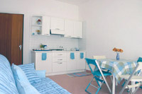 Apartment in Sorrento: The living-room with the kitchen-corner of Margherita Apartment in Sorrento